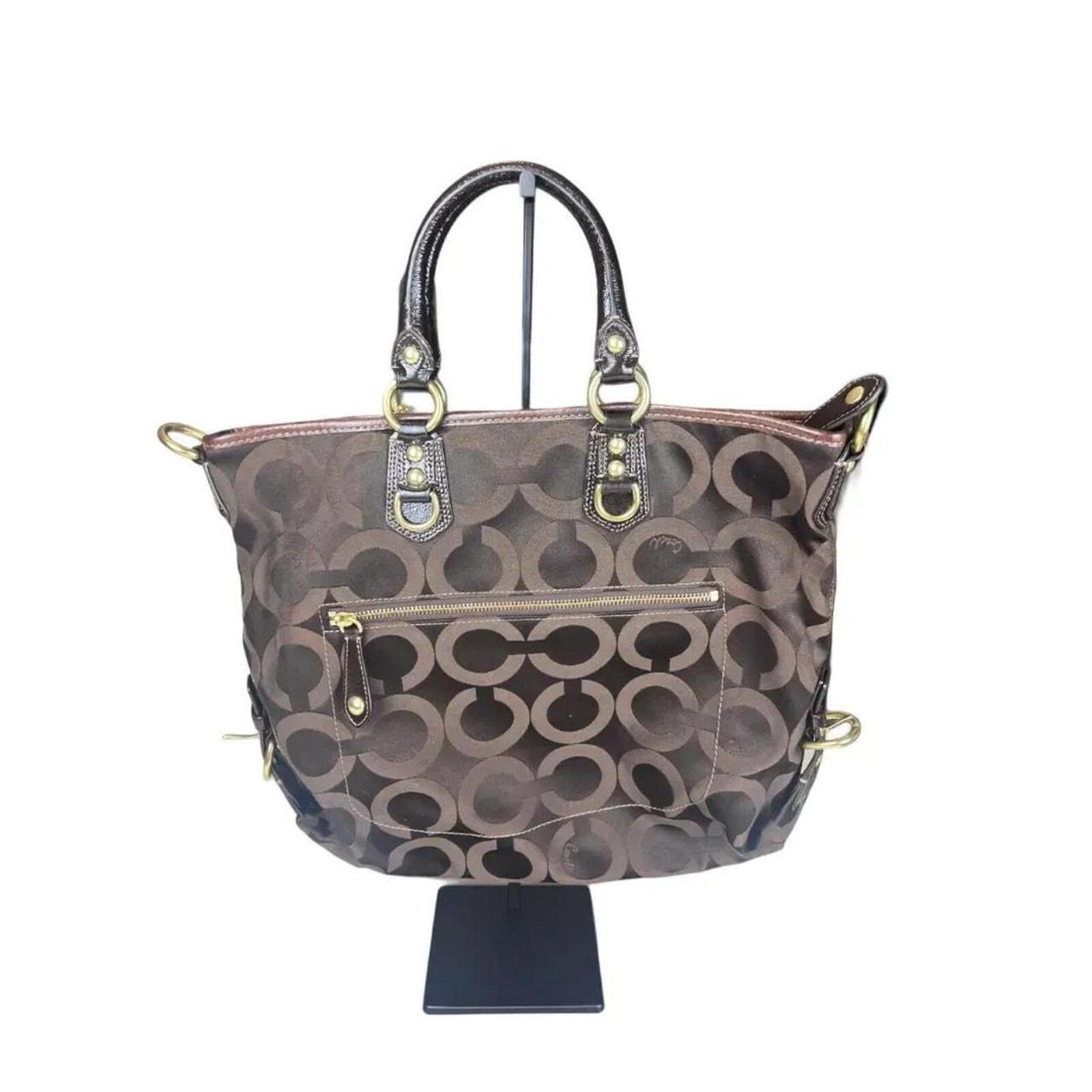 A Coach Julianne Tote Satchel in brown canvas and leather