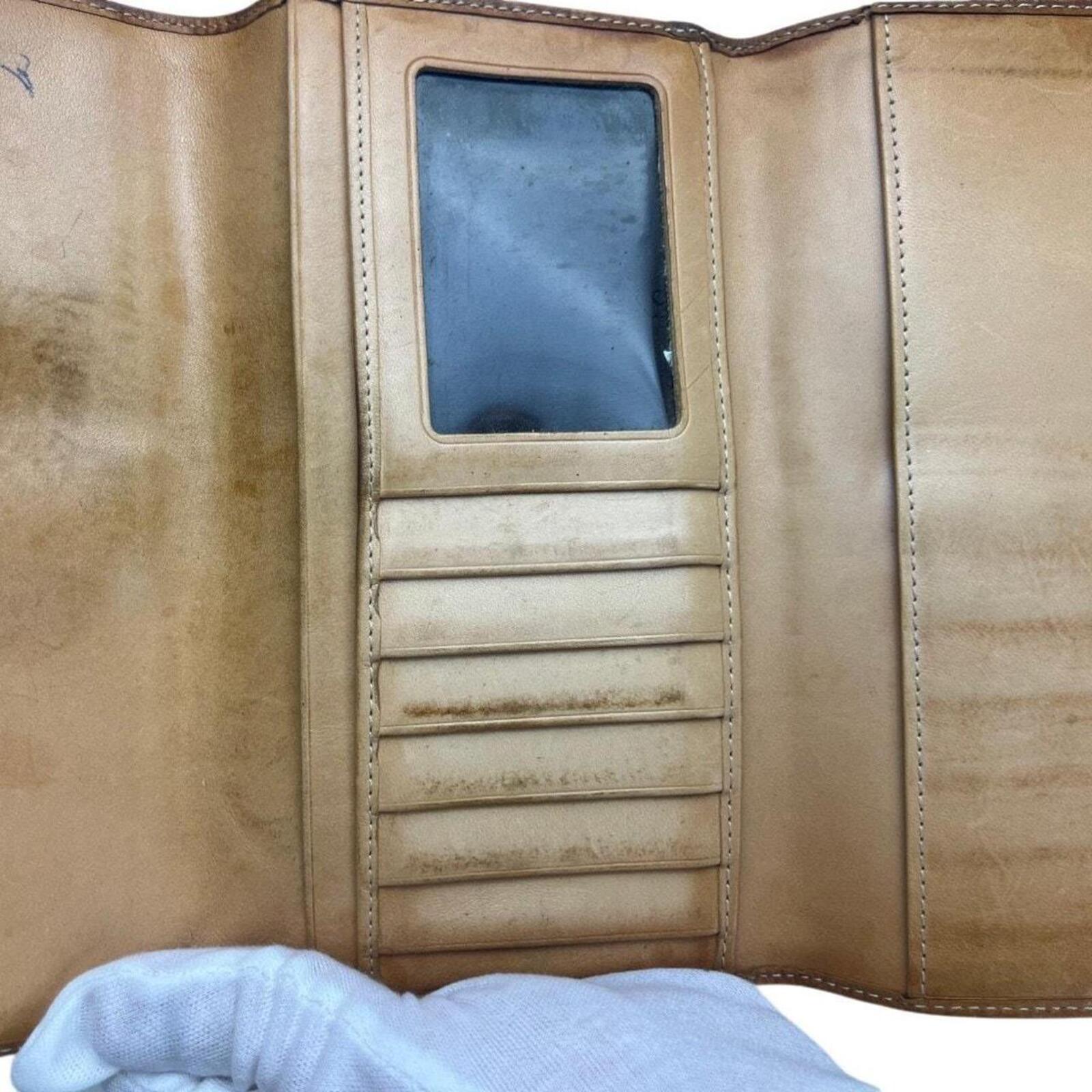 Coach signature brown & tan canvas snap wallet