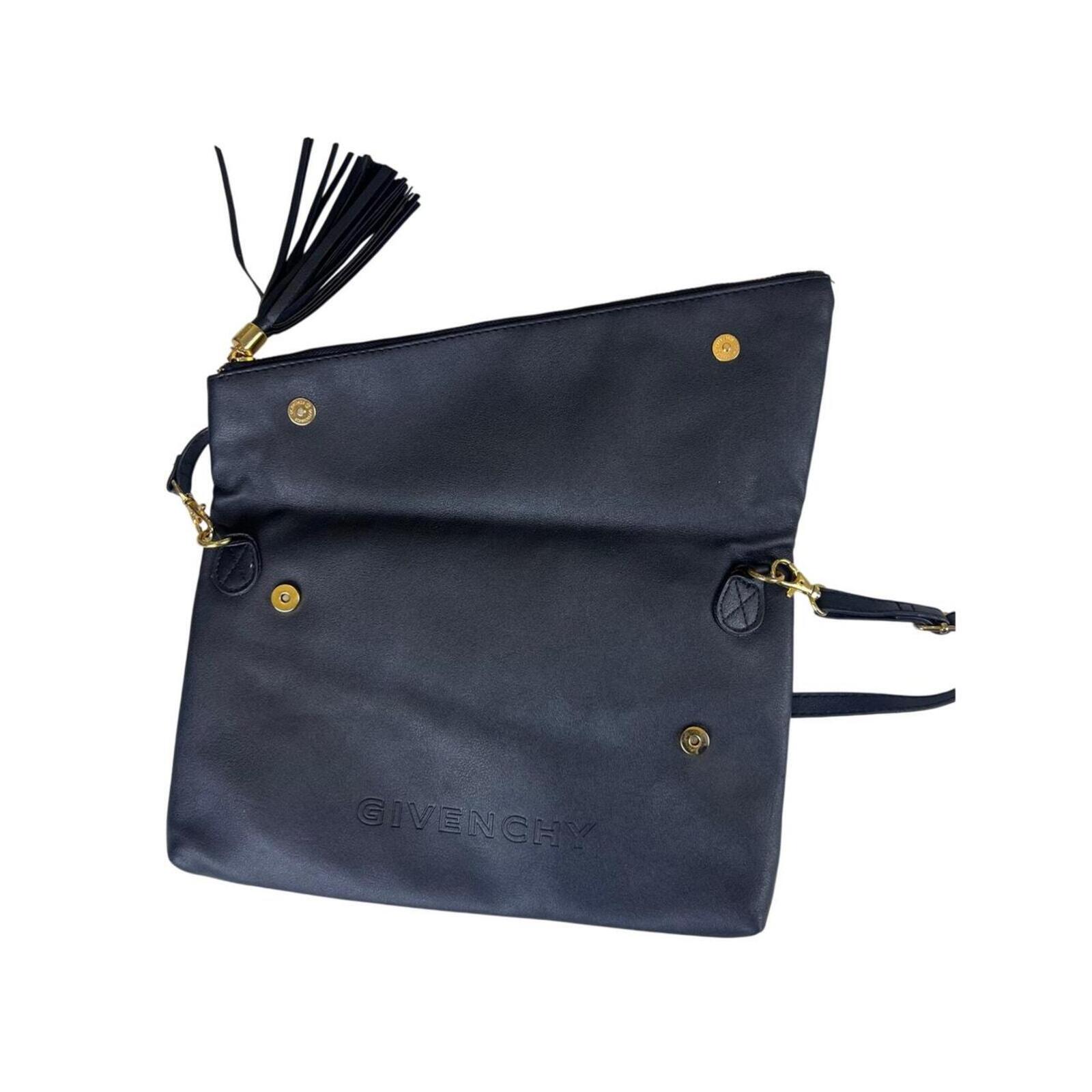 Givenchy black leather shoulder/clutch — sleek, minimalist designer bag in smooth black leather; versatile day-to-night elegance.