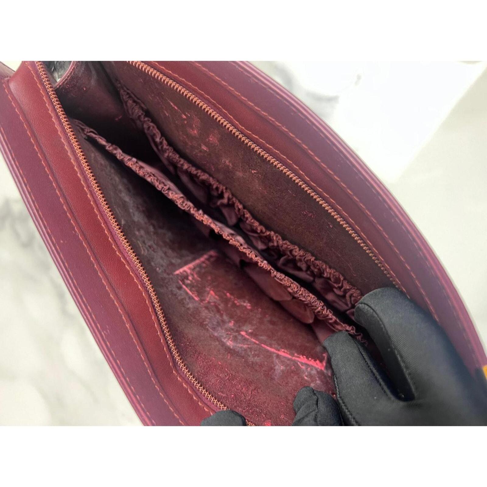 Must De Cartier Burgundy Leather Cutch Bag