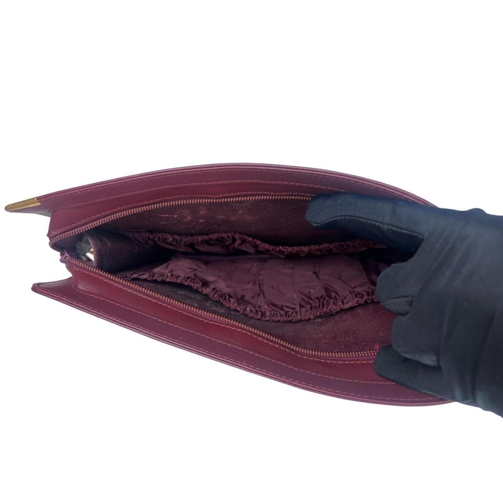 Must De Cartier Burgundy Leather Cutch Bag