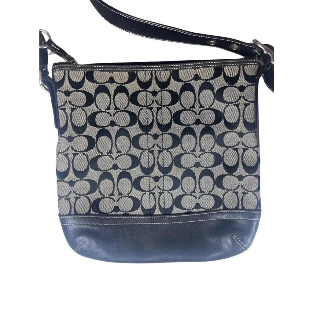 A classic Coach Signature Canvas Shoulder Bag in black and grey
