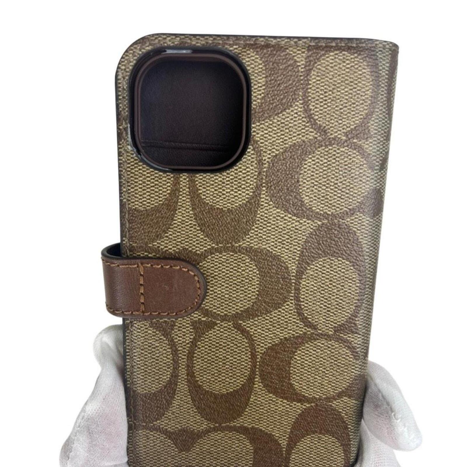 Coach signature-print iPhone 12 case with matching Coach holder