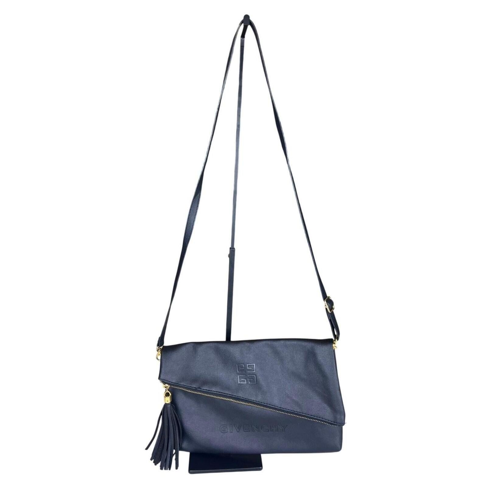Givenchy black leather shoulder/clutch — sleek, minimalist designer bag in smooth black leather; versatile day-to-night elegance.