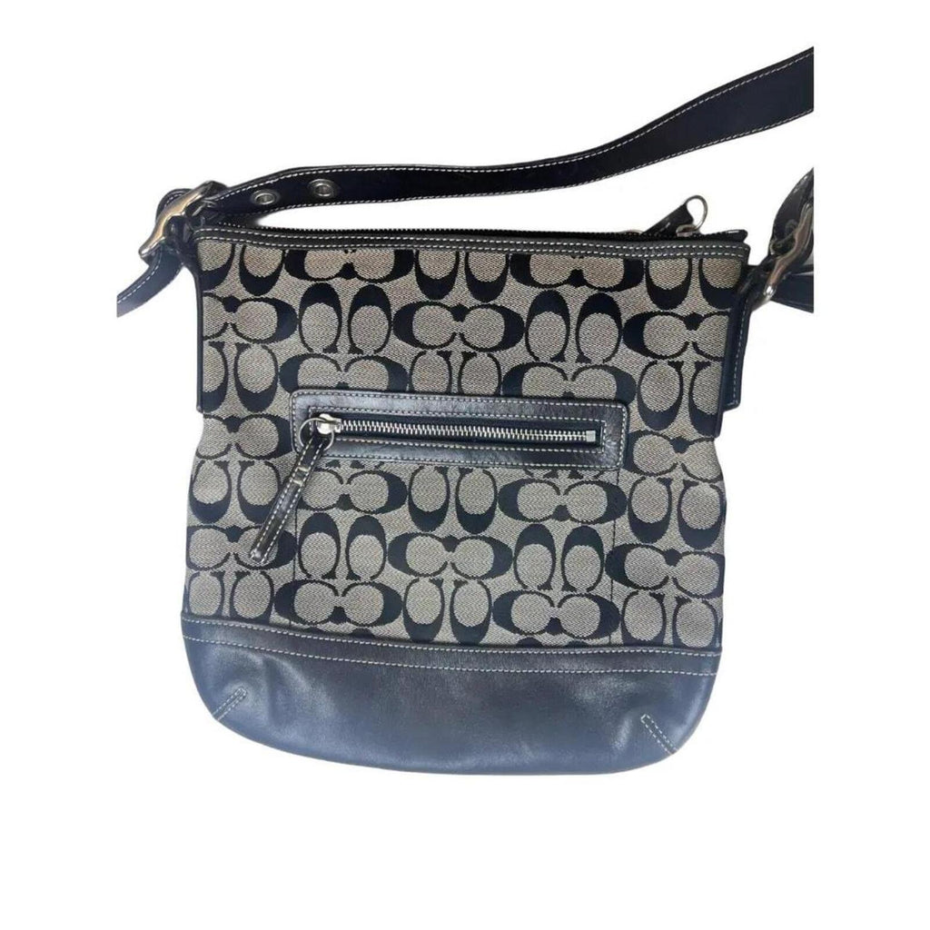 A classic Coach Signature Canvas Shoulder Bag in black and grey