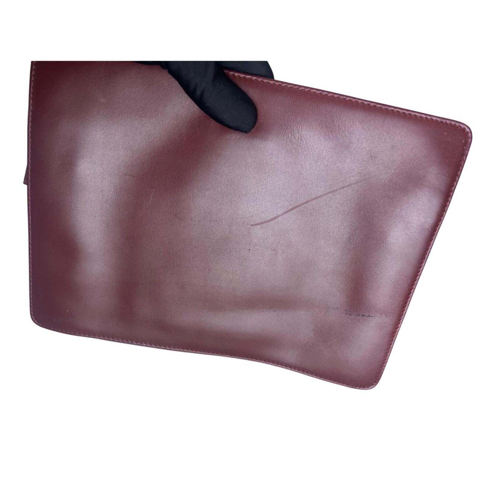 Must De Cartier Burgundy Leather Cutch Bag
