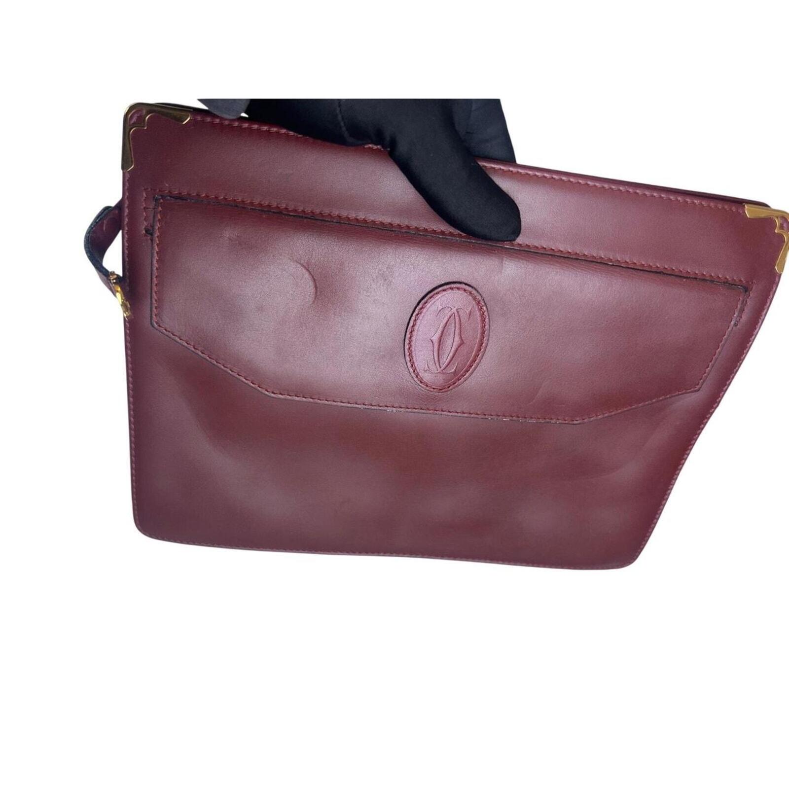 Must De Cartier Burgundy Leather Cutch Bag