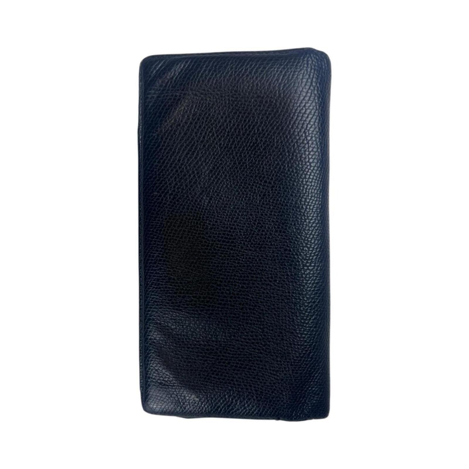 Coach black textured leather travel wallet