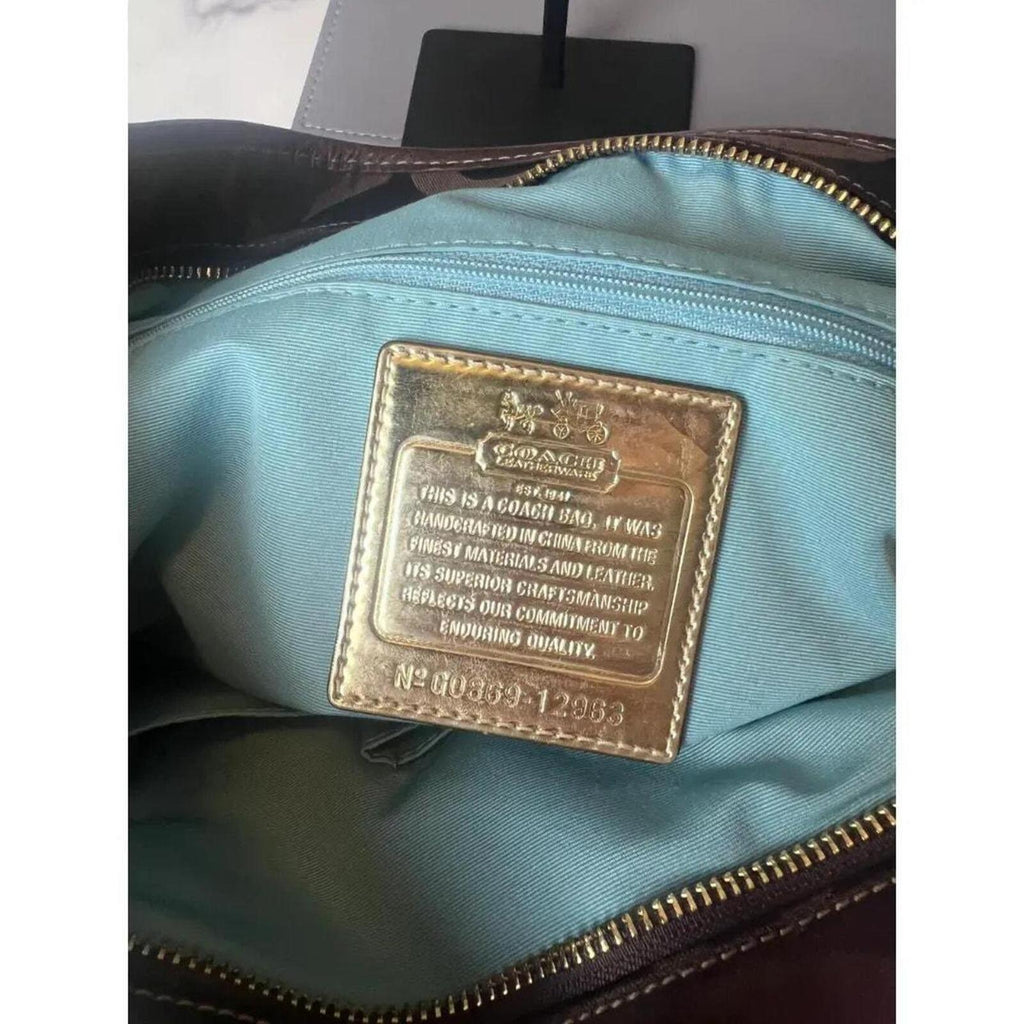 A Coach Julianne Tote Satchel in brown canvas and leather