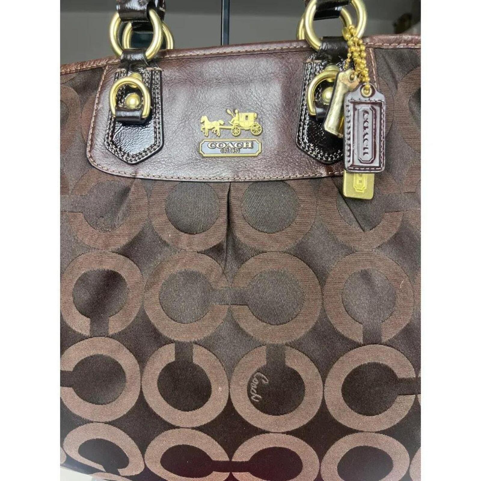 A Coach Julianne Tote Satchel in brown canvas and leather