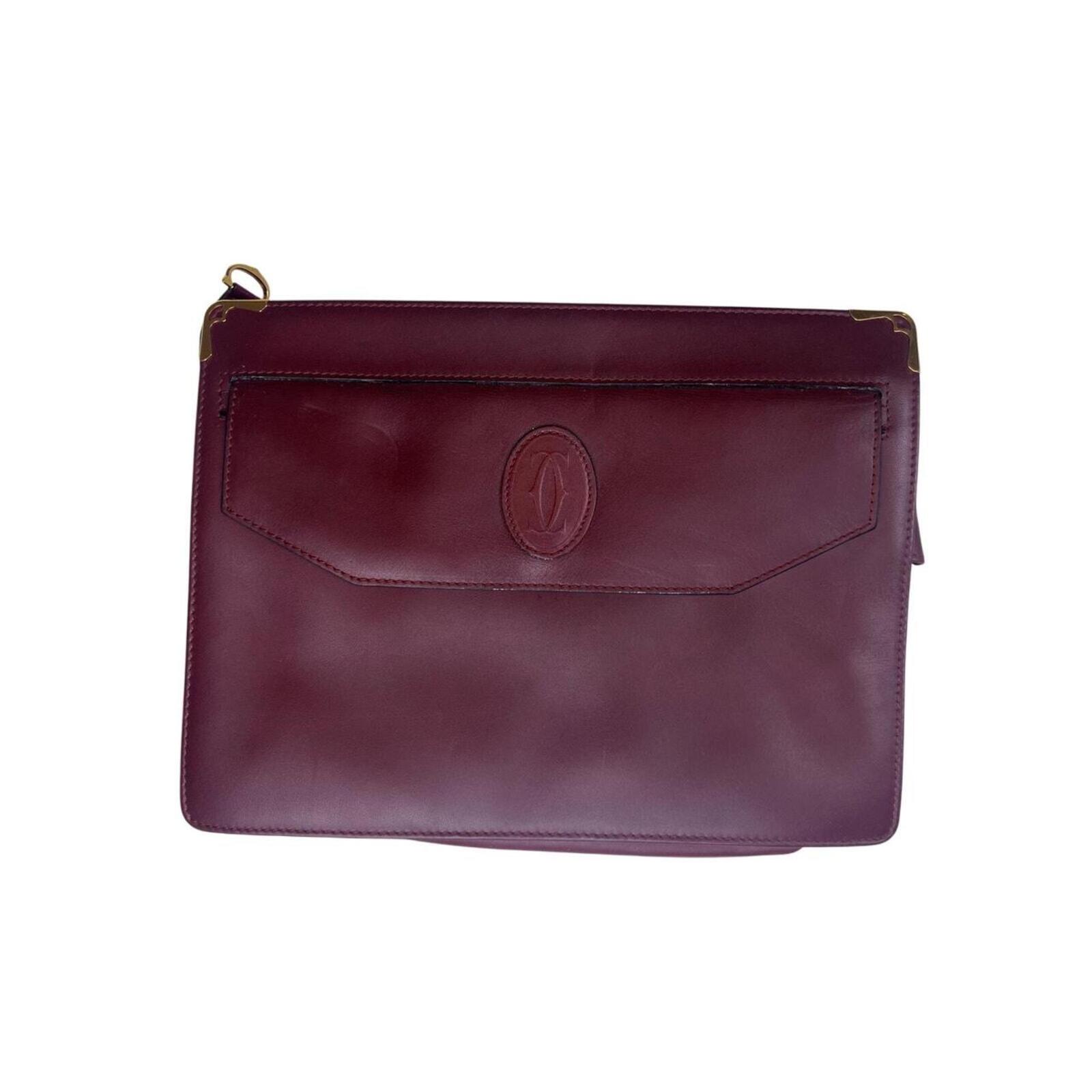 Must De Cartier Burgundy Leather Cutch Bag