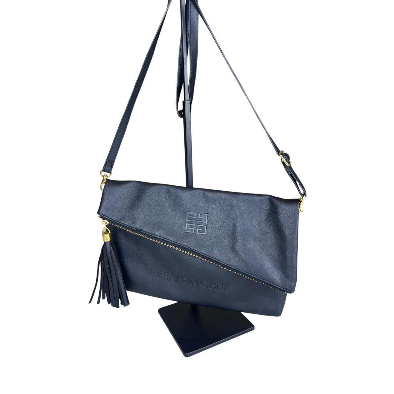 Givenchy black leather shoulder/clutch — sleek, minimalist designer bag in smooth black leather; versatile day-to-night elegance.