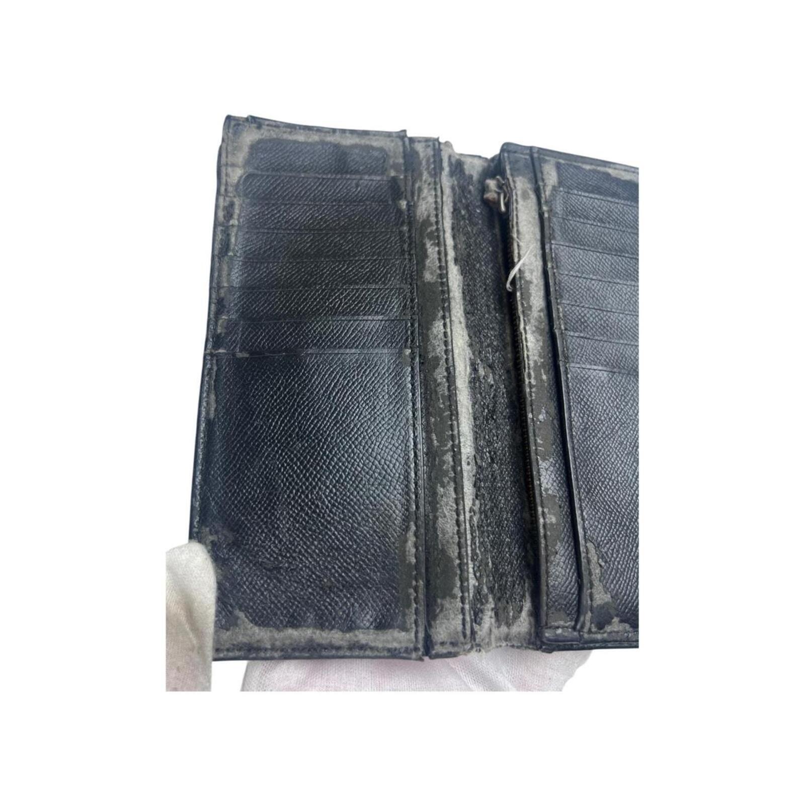 Coach black textured leather travel wallet